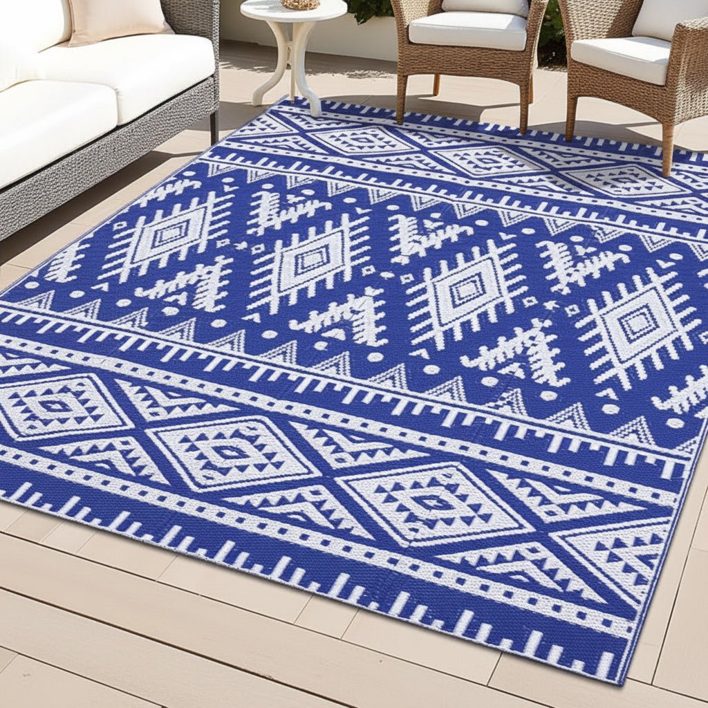 OUTWEAVE Reversible Outdoor Artificial Straw Mat